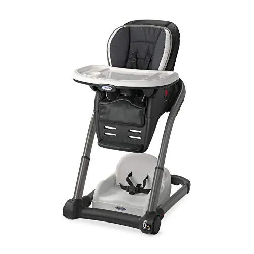 Graco Blossom high chair in use with infant