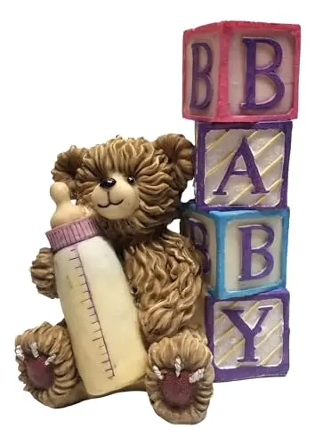 Generic resin vase with teddy bear figurine holding baby bottle
